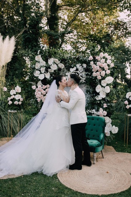 A moody dream garden wedding for a fashion forward couple at Palacio Villahermosa in Spain