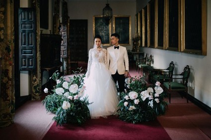 A moody dream garden wedding for a fashion forward couple at Palacio Villahermosa in Spain