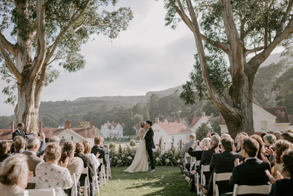 Organic same-sex wedding at Cavallo Point in San Francisco with the couple's children