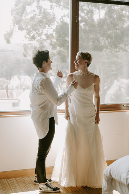 Organic same-sex wedding at Cavallo Point in San Francisco with the couple's children