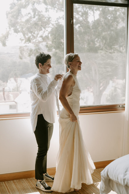 Organic same-sex wedding at Cavallo Point in San Francisco with the couple's children