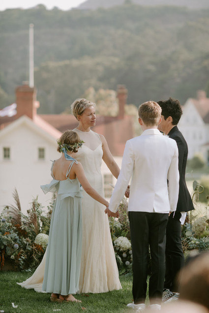 Organic same-sex wedding at Cavallo Point in San Francisco with the couple's children