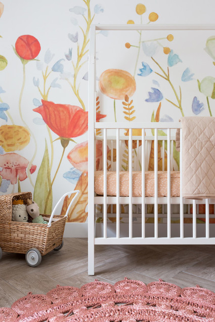 Cara Loren's floral feminine girl's nursery with Lulu & Georgia