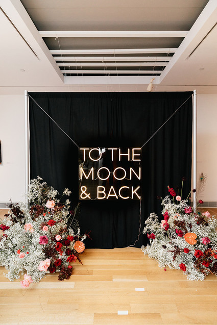 neon ceremony backdrop