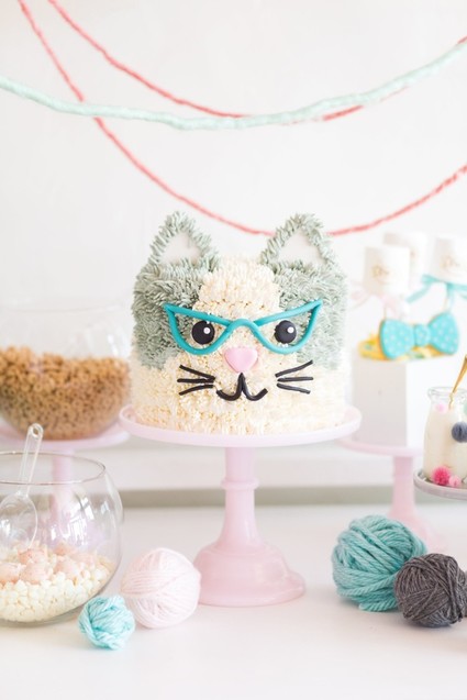 A kitty cat second birthday party with the most incredibly fun decor