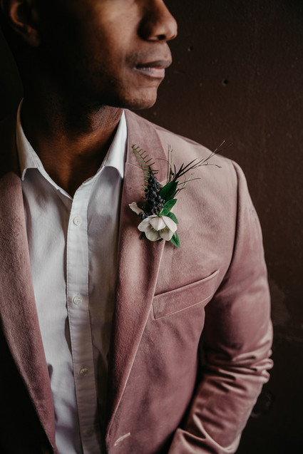 Fashion-forward groom style with a mauve jacket