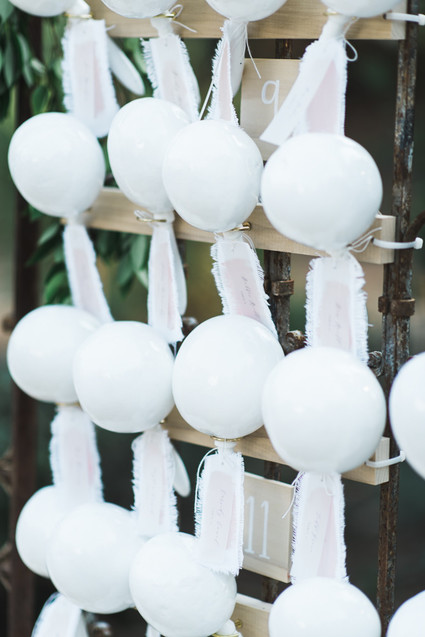 all white maraca escort card display