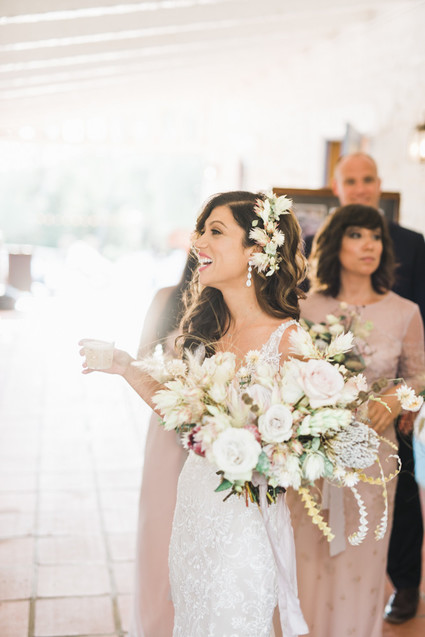 An all white Mexican inspires wedding at the most romantic Spanish venue in San Diego