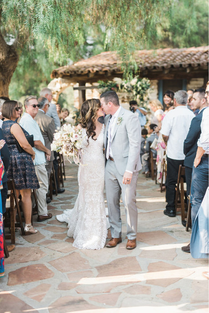 An all white Mexican inspires wedding at the most romantic Spanish venue in San Diego