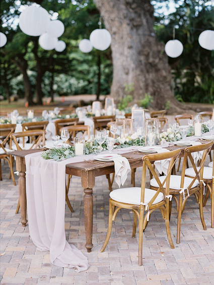 Romantic mauve Maui wedding with the most magical reception setting at Olowalu Plantation House