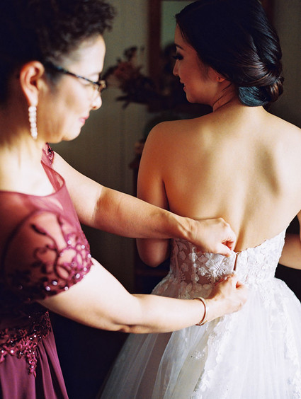 Romantic mauve Maui wedding with the most magical reception setting at Olowalu Plantation House