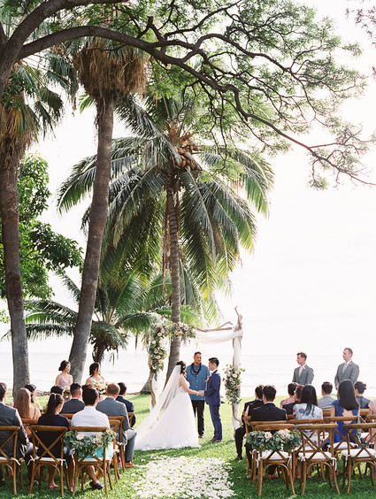 Romantic mauve Maui wedding with the most magical reception setting at Olowalu Plantation House
