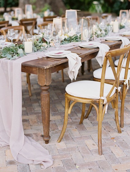 Romantic mauve Maui wedding with the most magical reception setting at Olowalu Plantation House