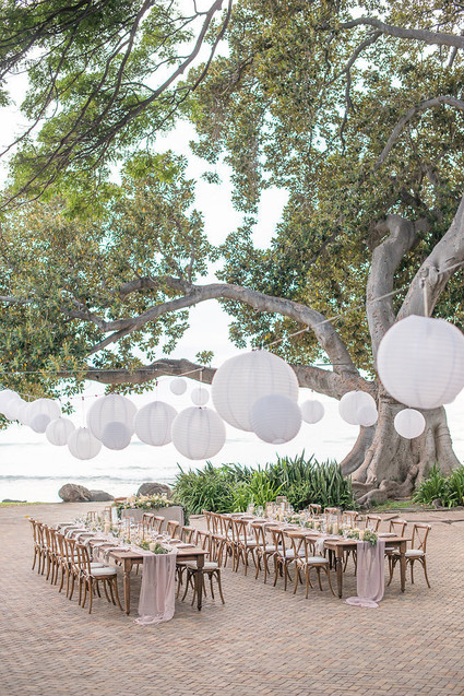 Romantic mauve Maui wedding with the most magical reception setting at Olowalu Plantation House