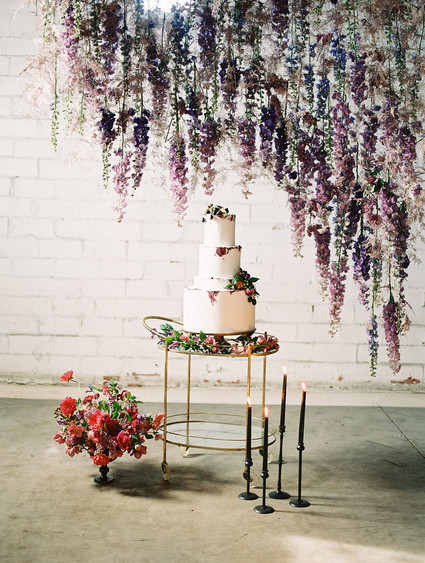 Bright moody spring wedding inspo with a dramatic floral curtain