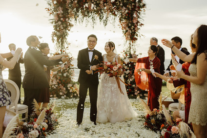 Tropical fall wedding in Thailand with rust and peachy accents