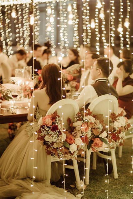 Tropical fall wedding in Thailand with rust and peachy accents