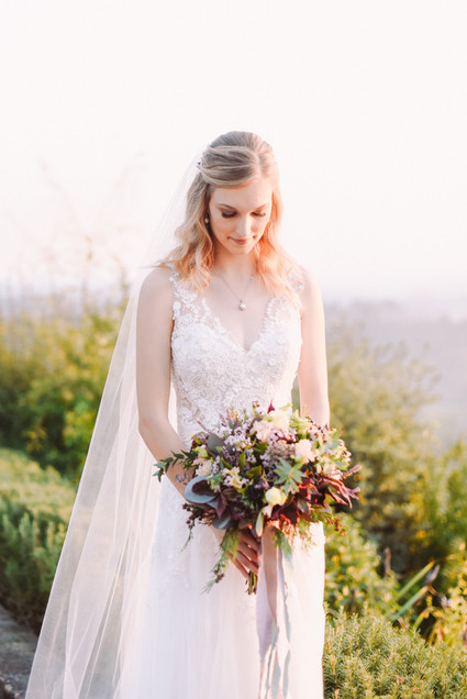 Romantic destination wedding at a pink Tuscan villa