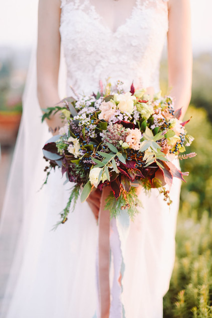 Romantic destination wedding at a pink Tuscan villa