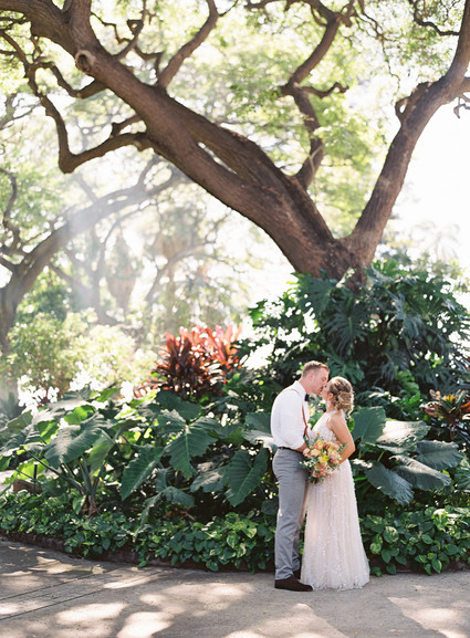 Romantic Hawaii wedding with an insanely cool dress, inspired by a Maui sunset