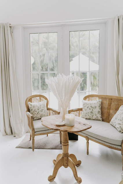 All white olive branch bridal shower with an epic grazing table