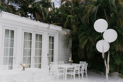 All white olive branch bridal shower with an epic grazing table