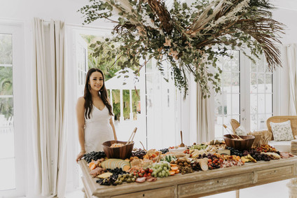 amazing grazing table for an all white bridal shower