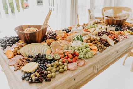 amazing grazing table for an all white bridal shower