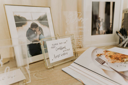 All white olive branch bridal shower with an epic grazing table