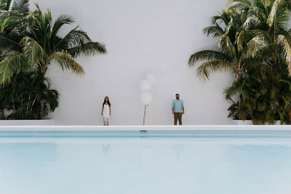 All white olive branch bridal shower with an epic grazing table