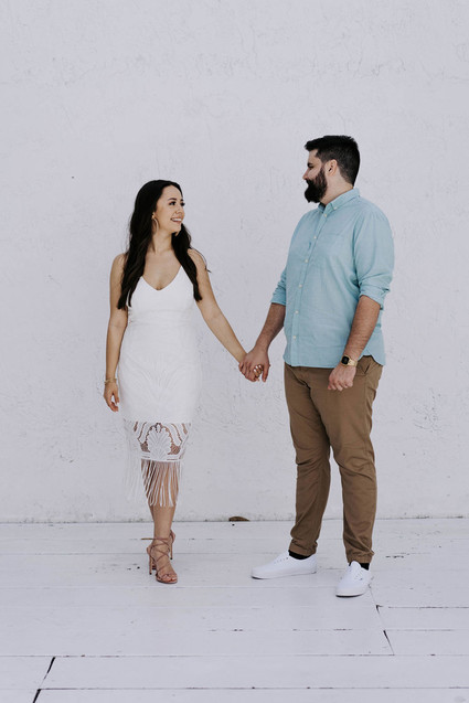 All white olive branch bridal shower with an epic grazing table