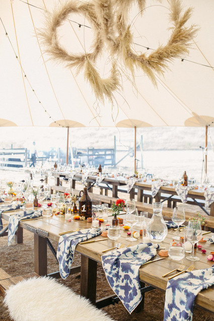 wedding tent with pampas grass wreaths