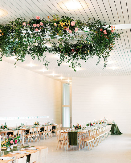 Floral ceiling wreath for jewel toned wedding at the Prospect House Austin