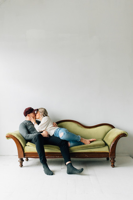 Cozy rainy day engagement photos styled at home