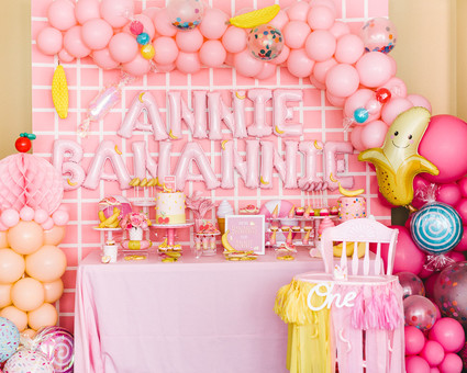 Pink and yellow Museum of Ice Cream themed first birthday party