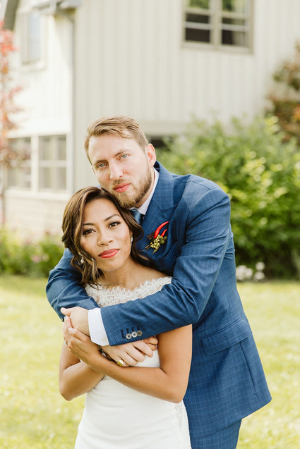 Farm to table summer wedding with pops of red and a PARADE