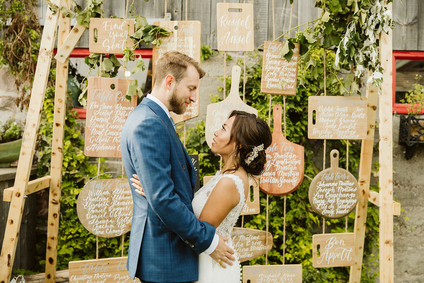 Farm to table summer barn wedding with pops of red and a PARADE