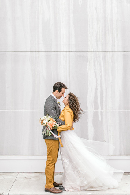 mustard and grey wedding fashion for bride and groom