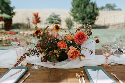 A rustic barn wedding at Red Barn Ranch inspired by berries and summer flowers