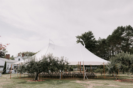 Green and white Maine barn wedding