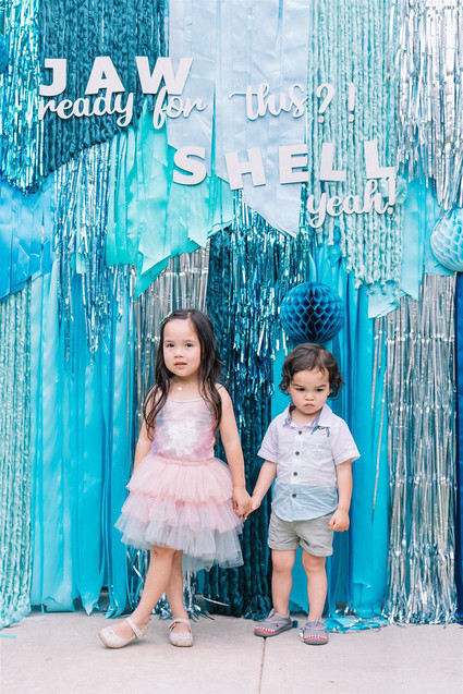 Sharks and mermaids joint birthday pool party