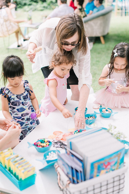 Sharks and mermaids joint birthday pool party