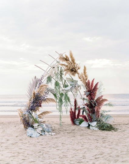 Dyed floral ceremony arch