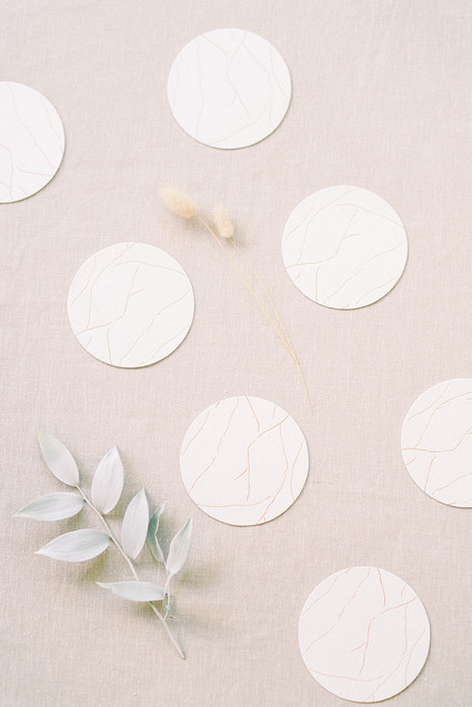 Gold and white coasters