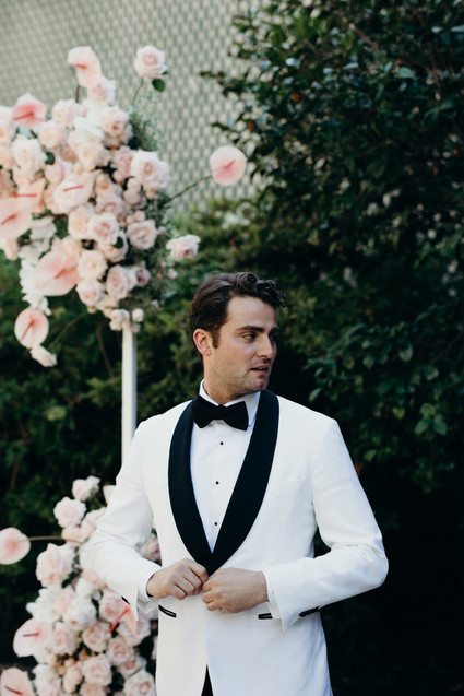 White + black groom's tux