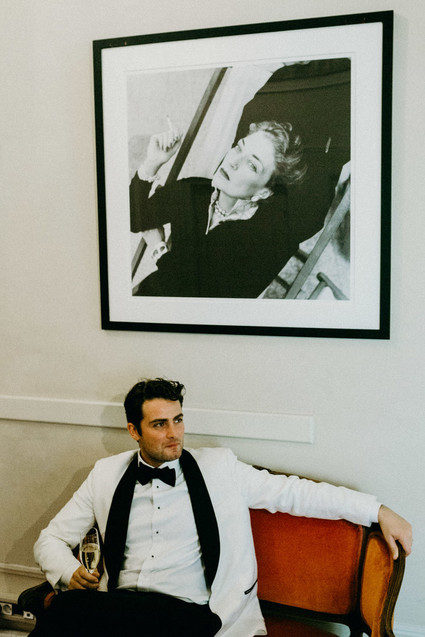 White + black groom's tux