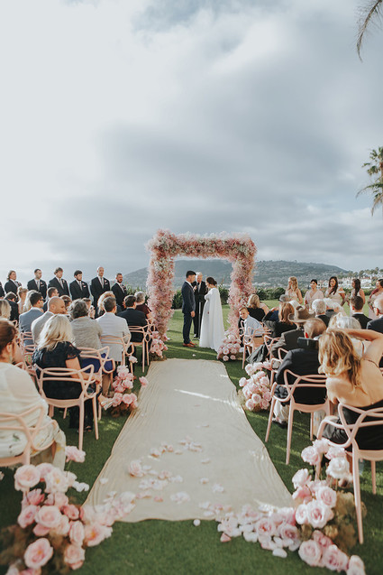 Pink babies breath wedding arch