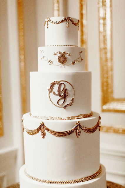 Elegant gold and white wedding cake