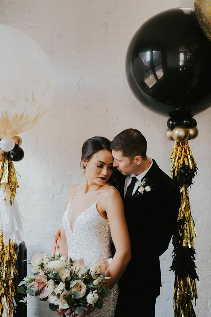 Black and gold tassel balloons