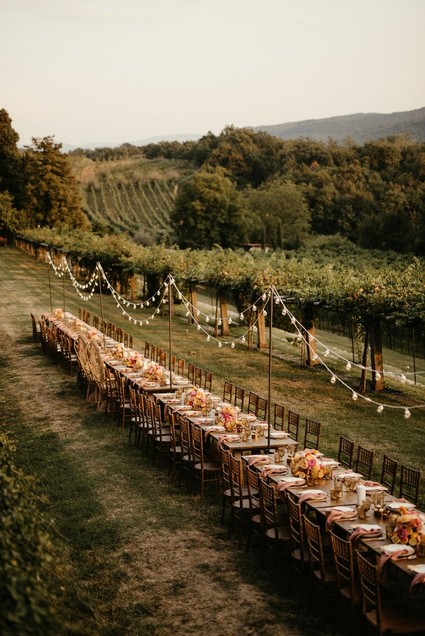 Long outdoor table with string lights